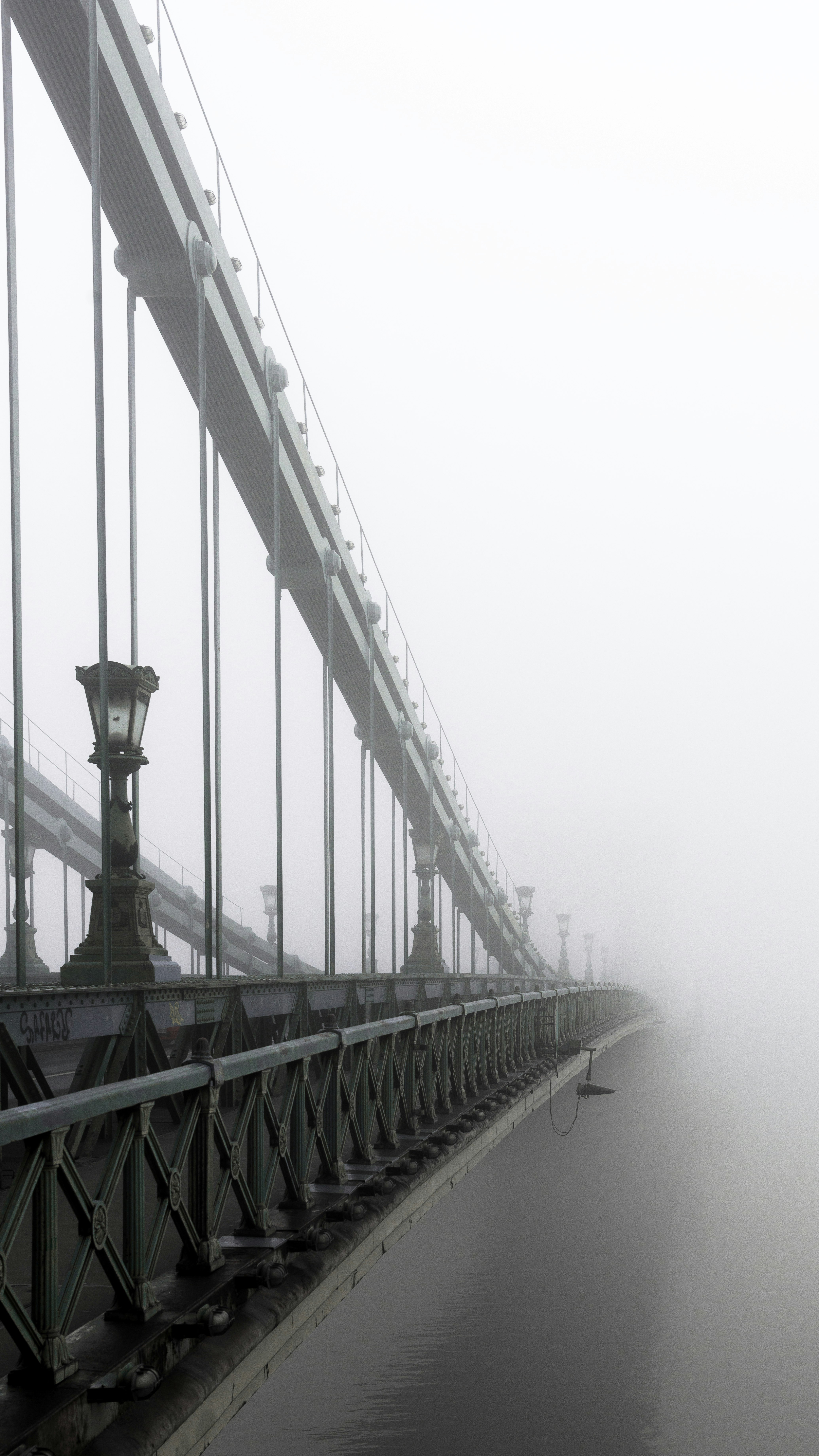 closeup photo of bridge and mist